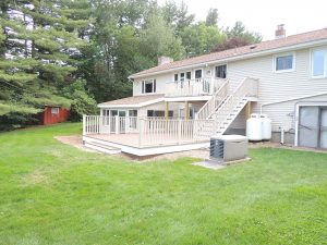 Deck Remodel - Small upper deck gives easy access to spacious deck below.